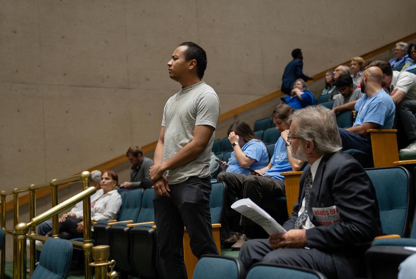 Hexel Colorado listens to speakers at a City Plan Commission meeting discussing the Forward Dallas plan at Dallas City Hall on July 11, 2024.